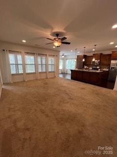 2496 Bergamot Street, Unit 61 Tega Cay, SC 29708 - Photo 40 of 43 a view of an empty room with window and cabinet