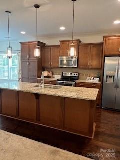 2496 Bergamot Street, Unit 61 Tega Cay, SC 29708 - Photo 42 of 43 a kitchen with kitchen island granite countertop a sink appliances and cabinets
