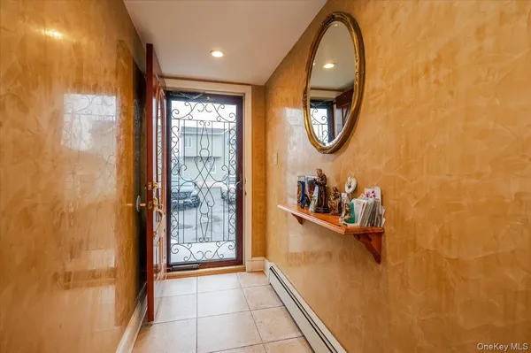 a bathroom with a mirror and a shower