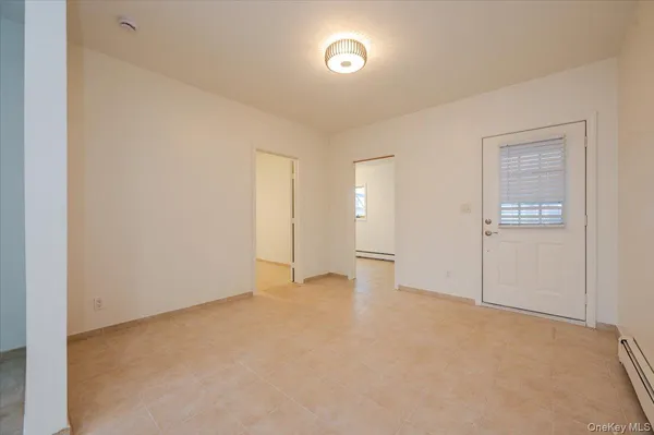 an empty room with an entryway