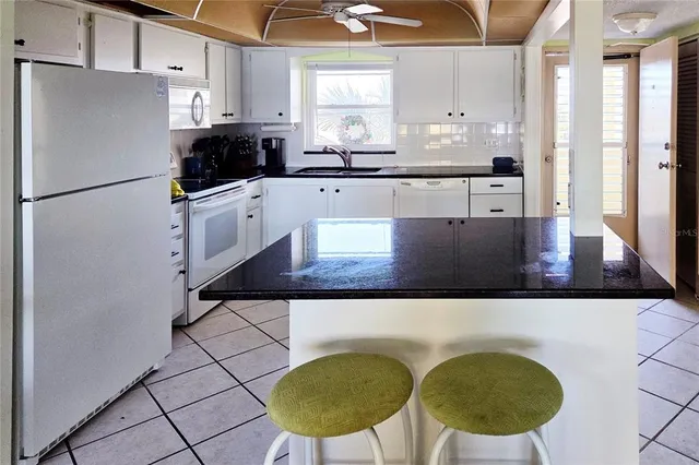 $209,000 | 4550 Cove Circle, Unit 406, St. Petersburg, FL 33708