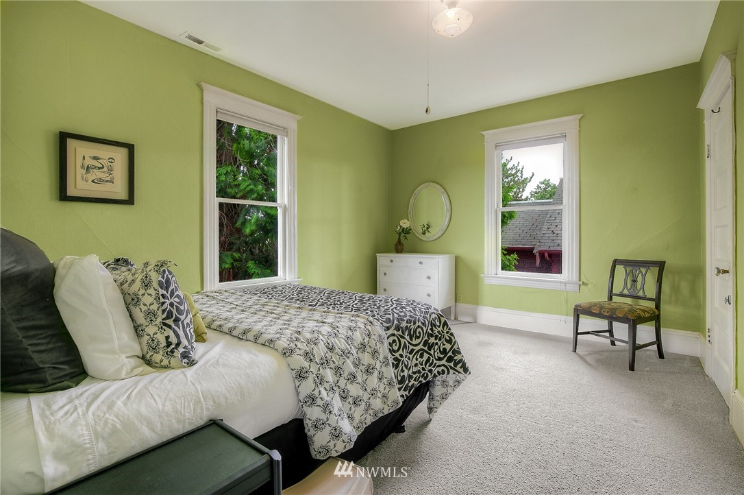 529 19th Avenue Seattle, WA 98122 - Photo 21 of 39 a bedroom with a bed chair and a window