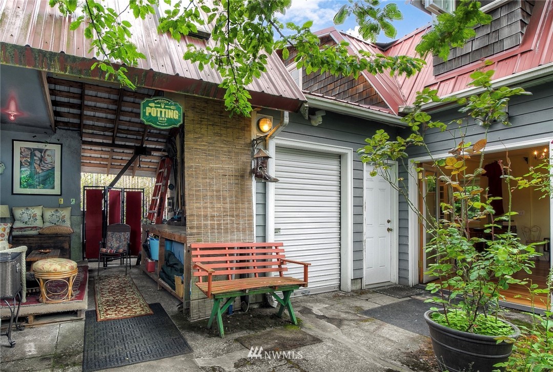 529 19th Avenue Seattle, WA 98122 - Photo 34 of 39 a view of a chair and table in backyard of the house