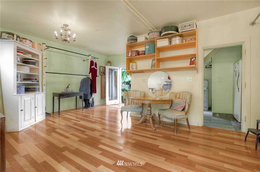529 19th Avenue Seattle, WA 98122 - Photo 36 of 39 a dining room with furniture and wooden floor