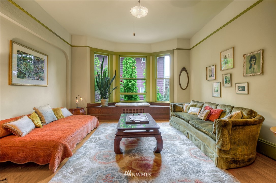 529 19th Avenue Seattle, WA 98122 - Photo 10 of 39 a living room with furniture and a large window