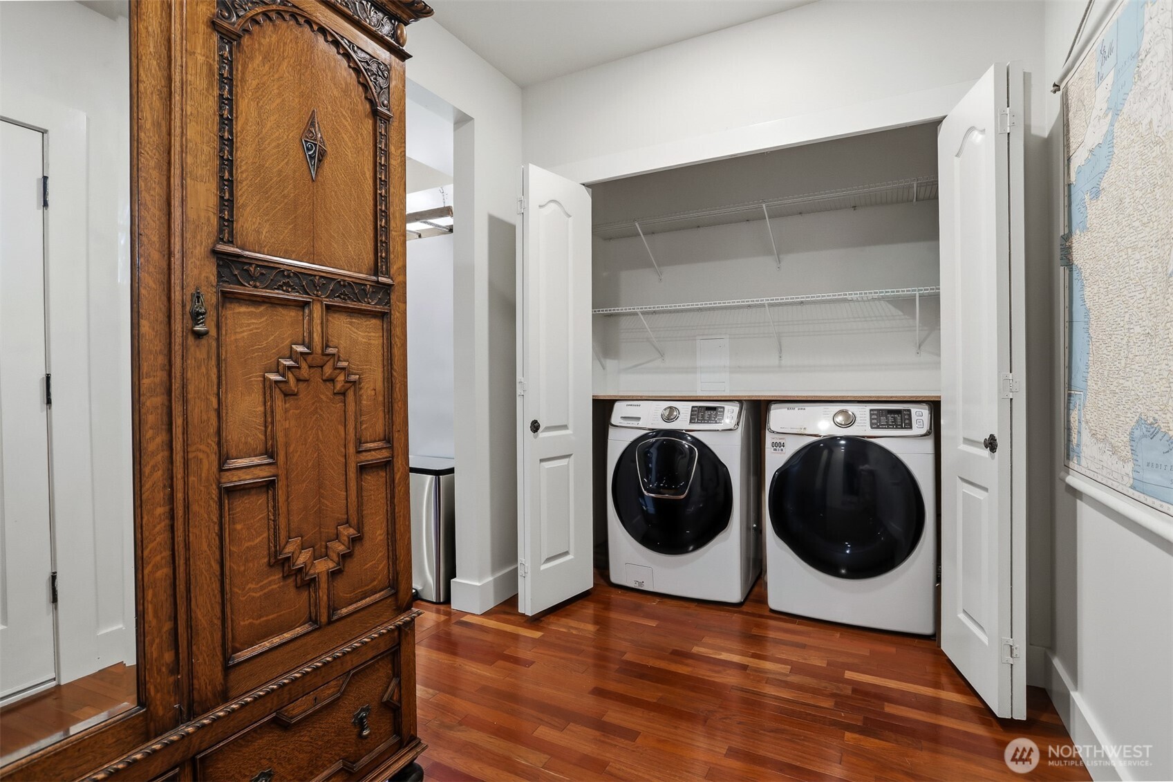 1749 Northwest 63rd Street Seattle, WA 98107 - Photo 5 of 40 a view of a bedroom with washer and dryer