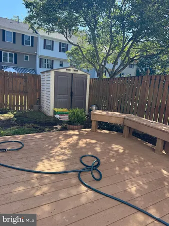 a backyard of a house with yard and outdoor seating