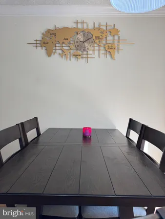 a bedroom with a bed and a lamp