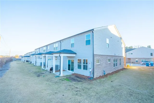 front view of a house with an empty space