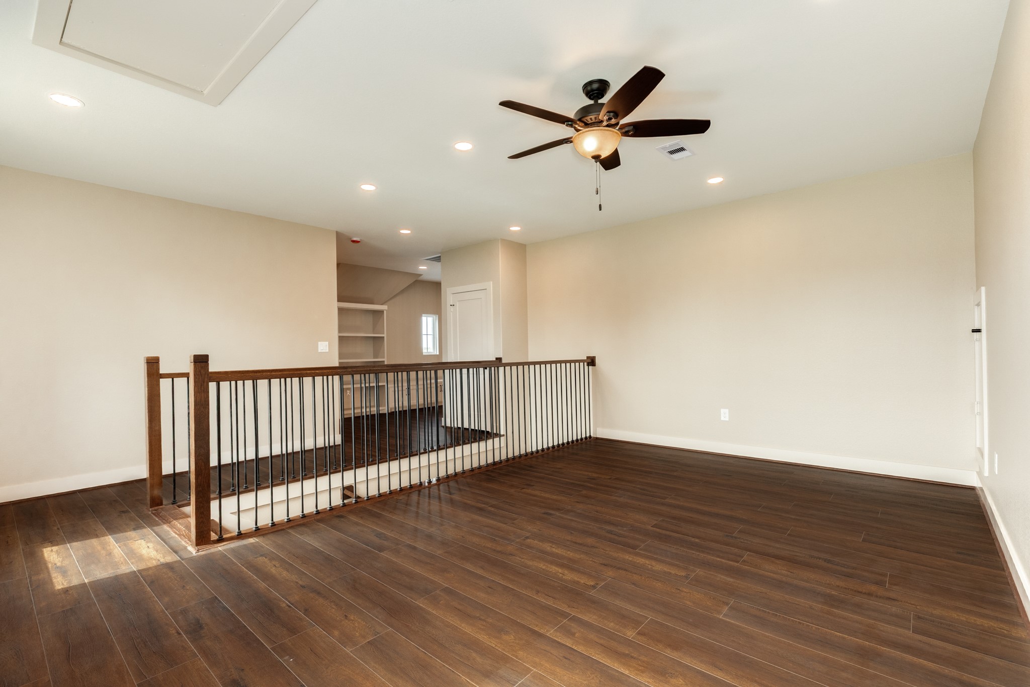 1737 Flintlock Court Angleton, TX 77515 - Photo 33 of 47 The upstairs offers a second flex living space. Perfect for game or media room.