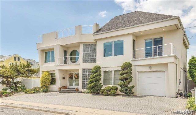 54 Matlock Street Lido Beach, NY 11561 - Photo 1 of 1 a front view of a house