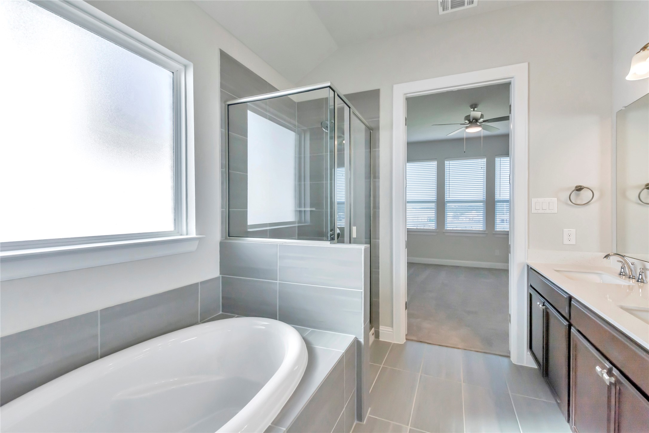 2140 Base Burner Path Leander, TX 78641 - Photo 19 of 27 a bathroom with a tub sink and mirror
