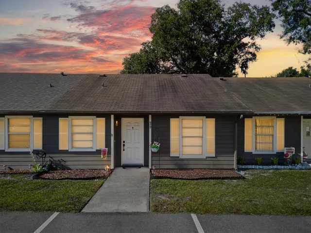 a front view of house with yard