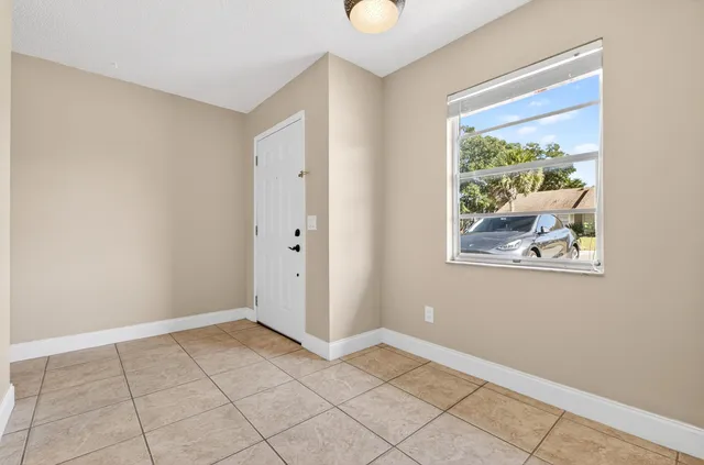 a view of an empty room with window