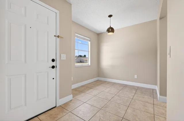 a view of an empty room with window