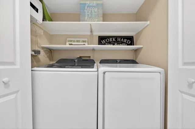 a kitchen with stainless steel appliances granite countertop a sink stove top oven and microwave