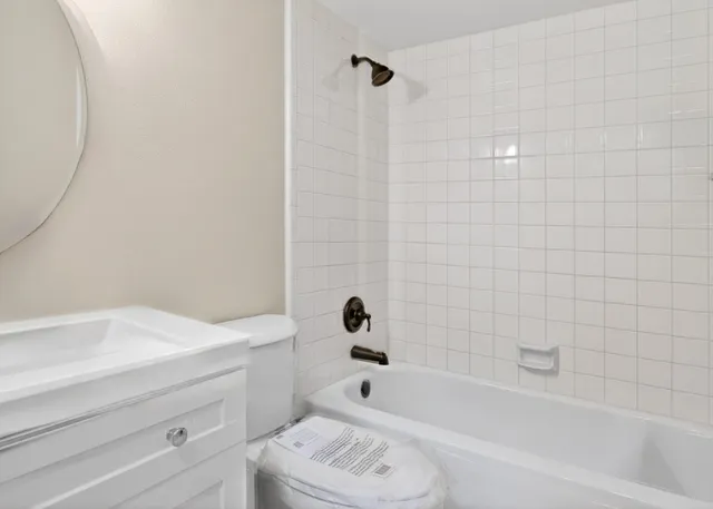 a view of a bathroom from the hallway