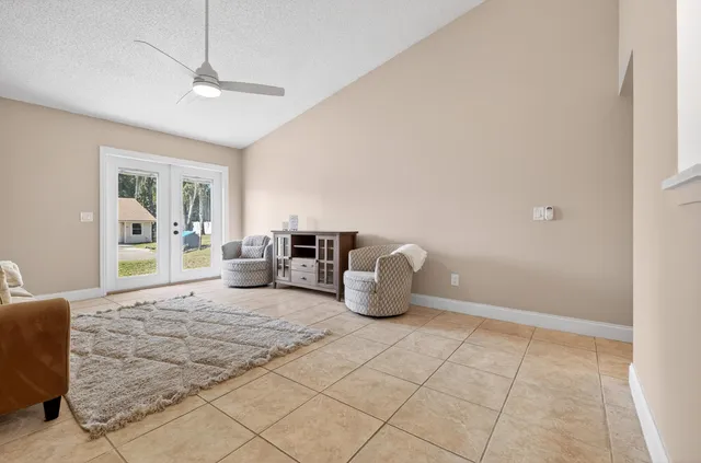 a living room with furniture and a couch
