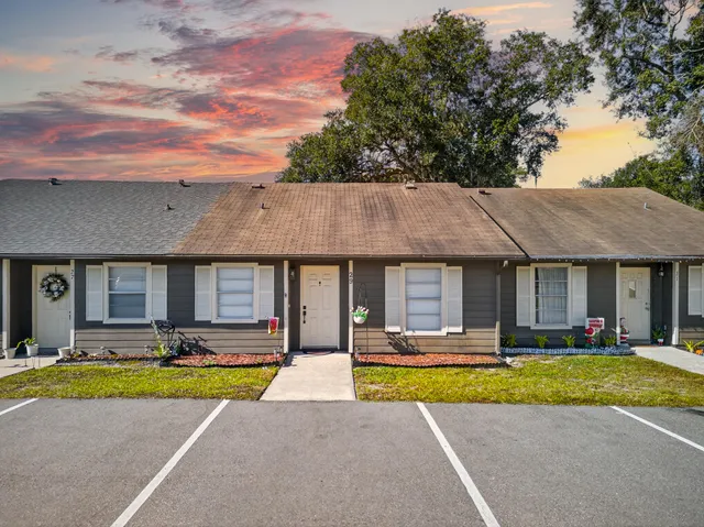 a view of swimming pool with outdoor seating and yard