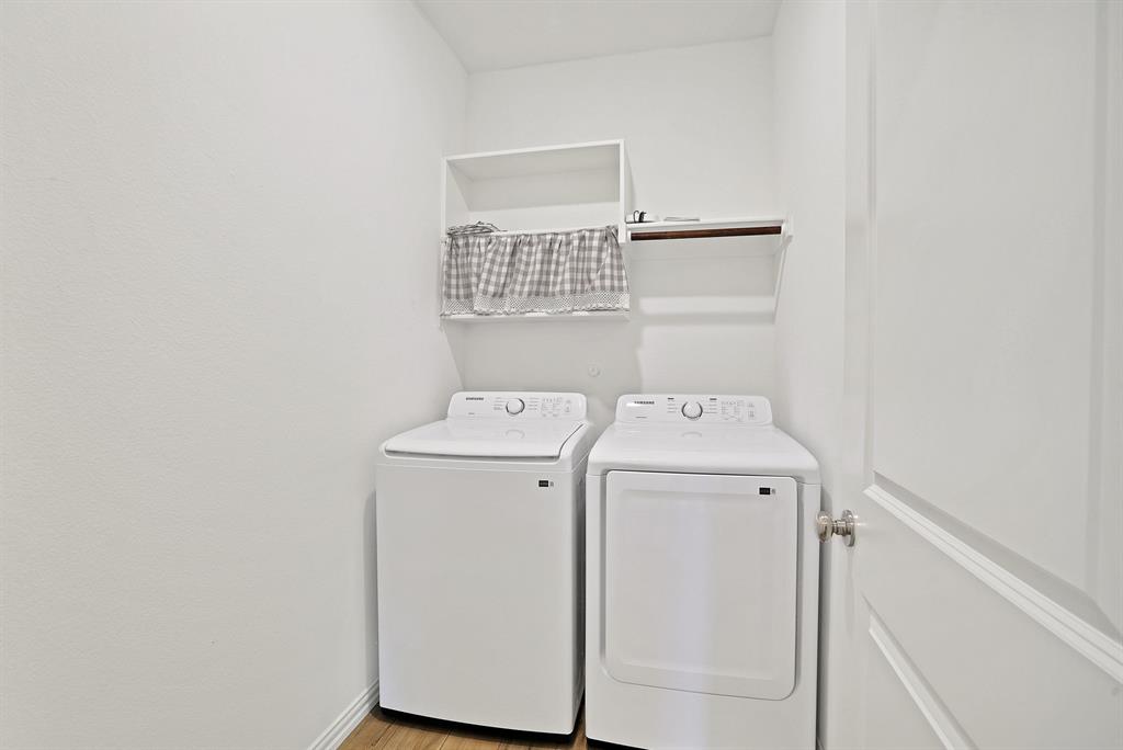 3204 Renaissance Drive Denton, TX 76207 - Photo 18 of 25 Dedicated laundry area with wood-finish flooring