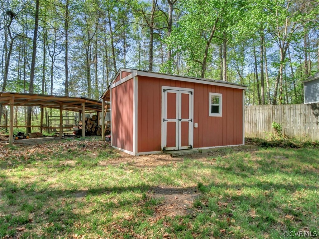 12113 Bundle Road Chesterfield, VA 23838 - Photo 23 of 25 Storage shed with Lean-to for extra storage.