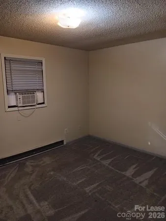 an empty room with a workbench
