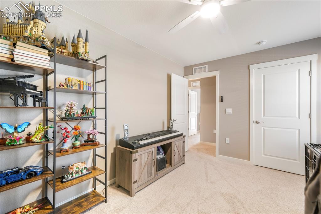 15882 Little Bluestem Road Monument, CO 80132 - Photo 28 of 50 Upstairs 2nd bedroom with walk in closet