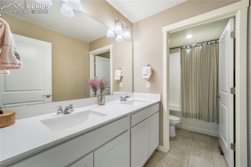 15882 Little Bluestem Road Monument, CO 80132 - Photo 32 of 50 Upstairs full bathroom with quartz counters