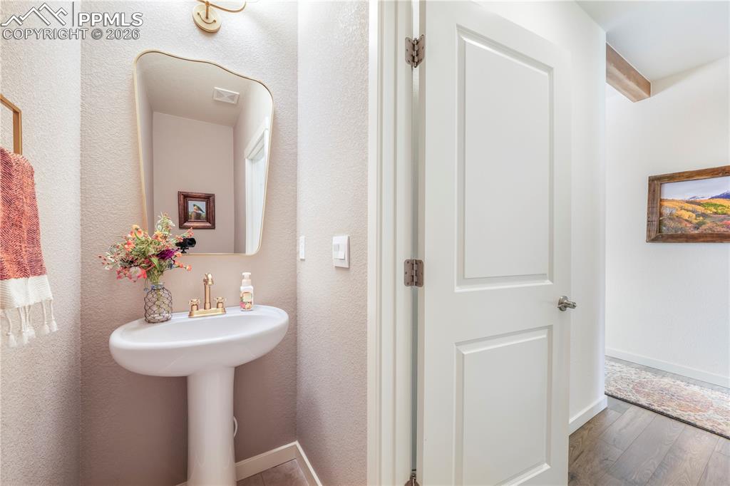 15882 Little Bluestem Road Monument, CO 80132 - Photo 8 of 50 Main level 1/2 bathroom