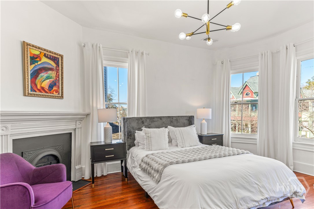 317 East Anderson Street Savannah, GA 31401 - Photo 12 of 15 Upstairs Front Bedroom with Bay Window