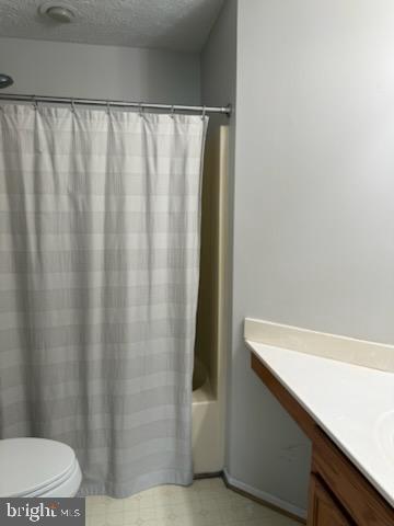 38 Jumpers Circle, Unit 253 Nottingham, MD 21236 - Photo 13 of 31 a bathroom with a shower curtain and a sink