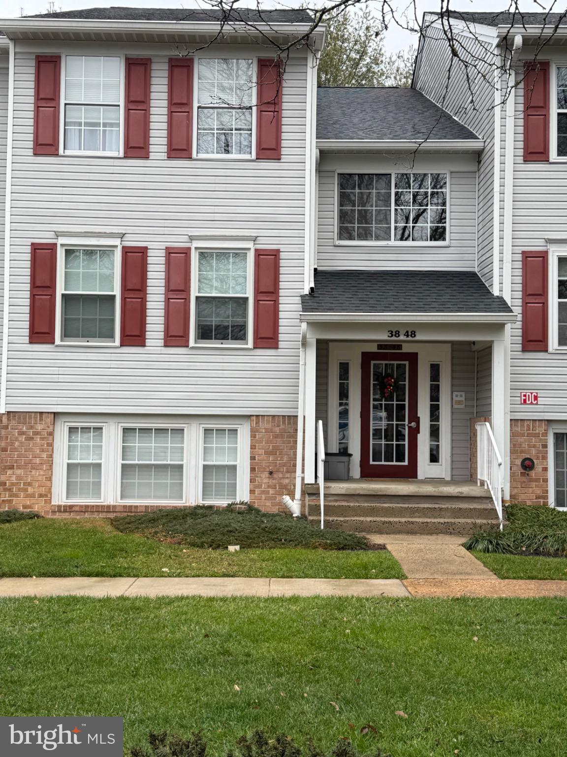 38 Jumpers Circle, Unit 253 Nottingham, MD 21236 - Photo 31 of 31 front view of a brick house