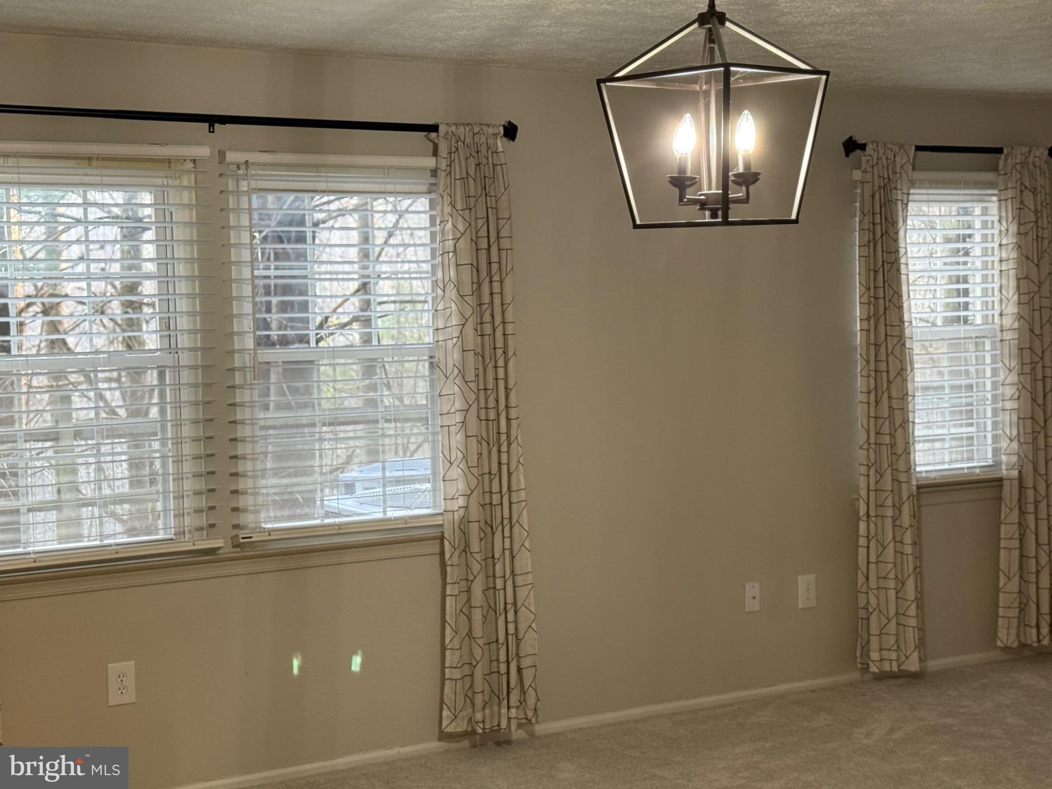 38 Jumpers Circle, Unit 253 Nottingham, MD 21236 - Photo 5 of 31 a view of an empty room with a window