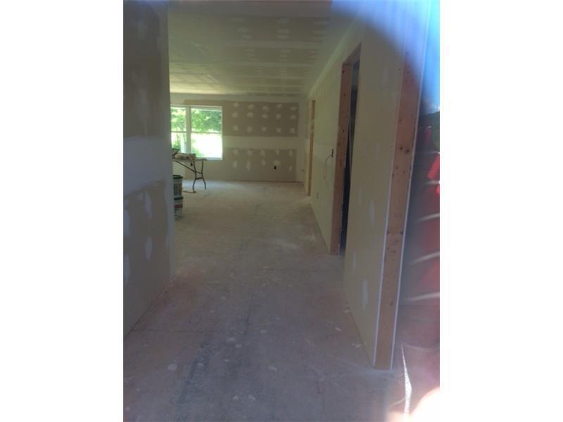 101 Rocky Dun Road West Baldwin, ME 04091 - Photo 8 of 10 Garage. rooms sheet rocked, electric...