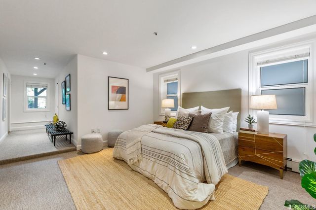 a bed room with bed and a couch