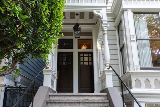 a view of a living room and dining room