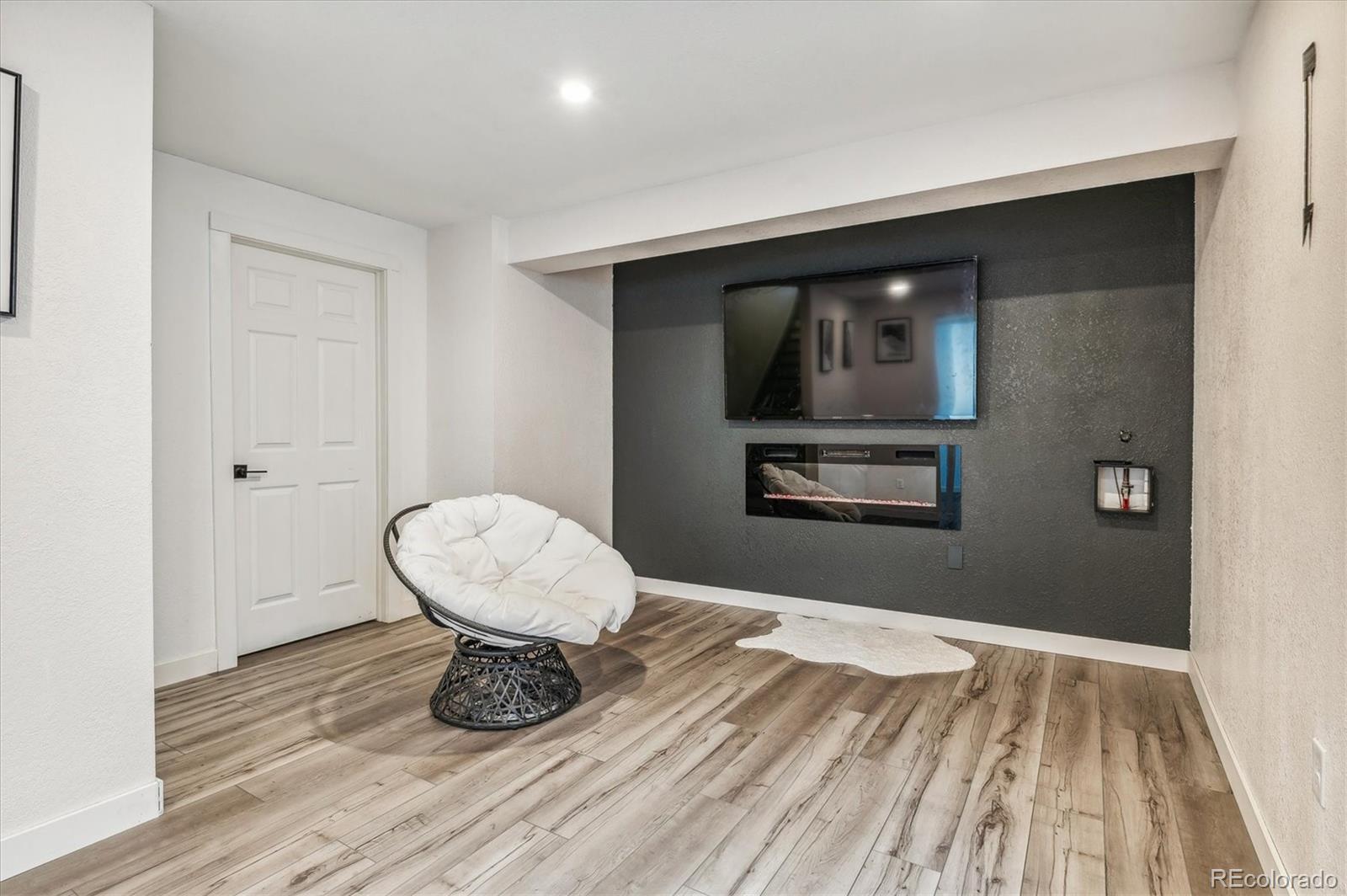 1345 Trail Ridge Road Longmont, CO 80504 - Photo 21 of 25 a view of wooden floor in a room