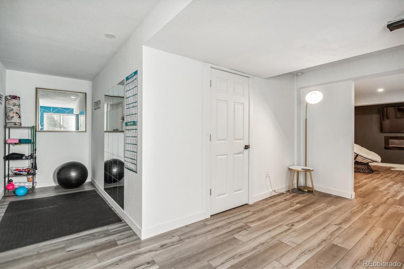 1345 Trail Ridge Road Longmont, CO 80504 - Photo 23 of 25 a view of a room with wooden floor and closet space