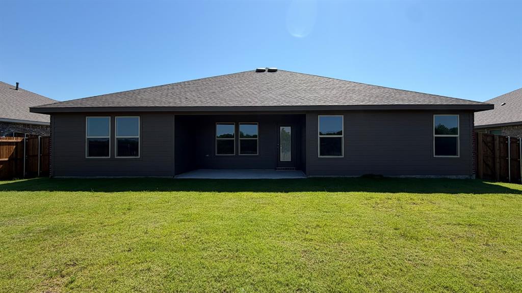 1921 Reveille Way Terrell, TX 75160 - Photo 24 of 30 a front view of a house with yard