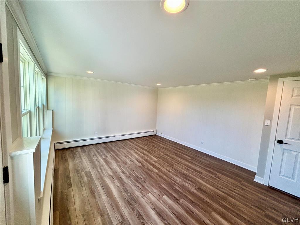 3172 Shakespeare Road Bethlehem, PA 18017 - Photo 4 of 19 a view of an empty room with wooden floor and a window