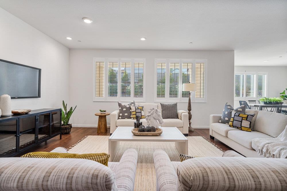 20 Hospital Road Hollister, CA 95023 - Photo 11 of 46 a living room with furniture and a flat screen tv