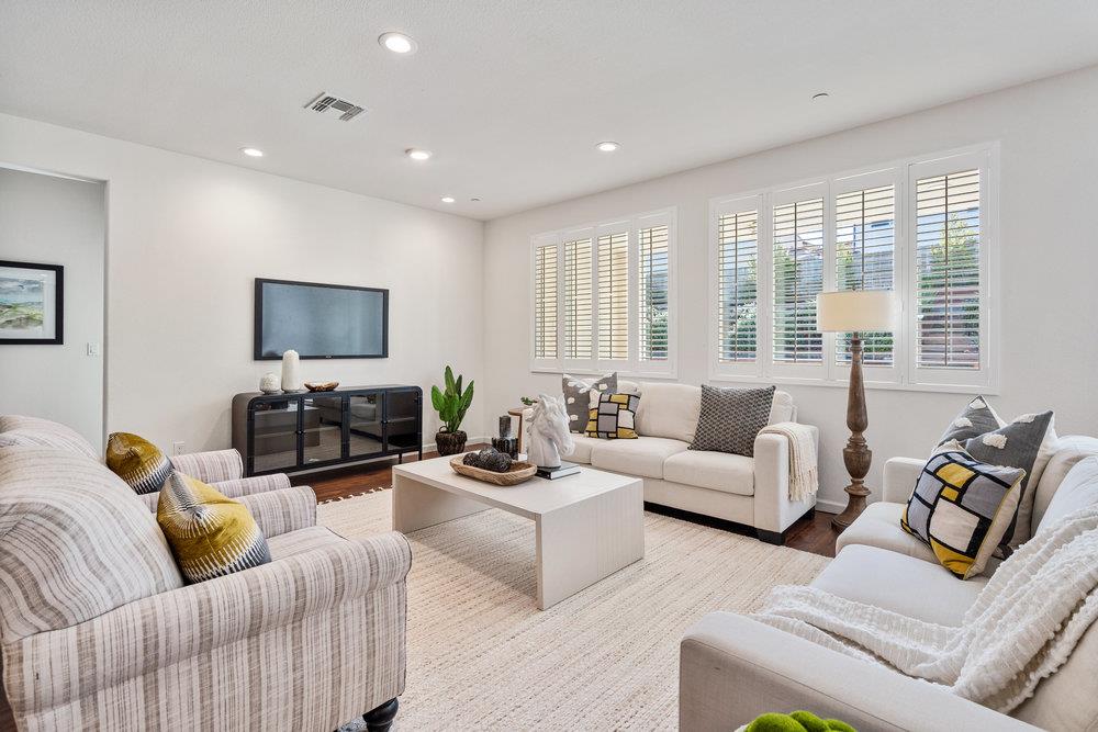 20 Hospital Road Hollister, CA 95023 - Photo 12 of 46 a living room with furniture and a flat screen tv