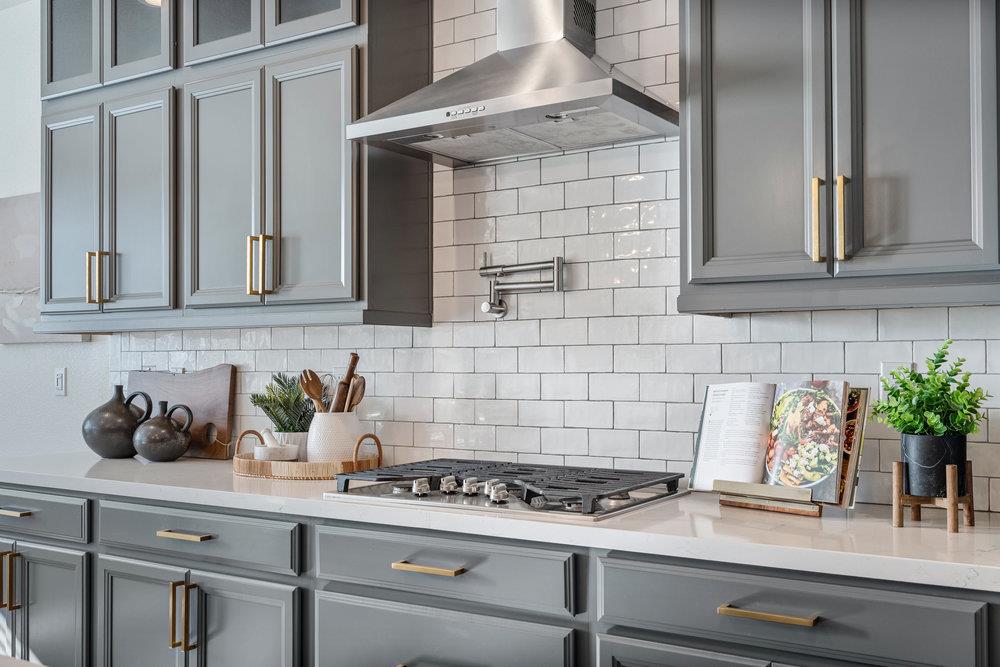 20 Hospital Road Hollister, CA 95023 - Photo 17 of 46 a kitchen with a sink and cabinets
