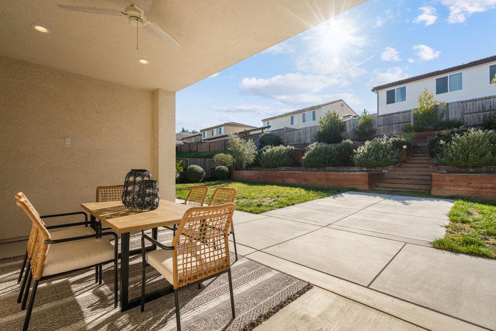 20 Hospital Road Hollister, CA 95023 - Photo 20 of 46 a view of a patio with table and chairs and potted plants