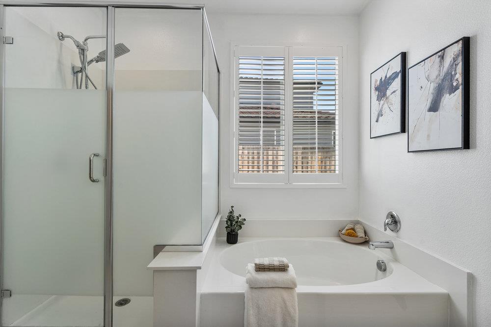20 Hospital Road Hollister, CA 95023 - Photo 28 of 46 a bathroom with a bathtub and a window