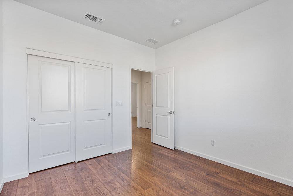 20 Hospital Road Hollister, CA 95023 - Photo 29 of 46 a view of an empty room with wooden floor