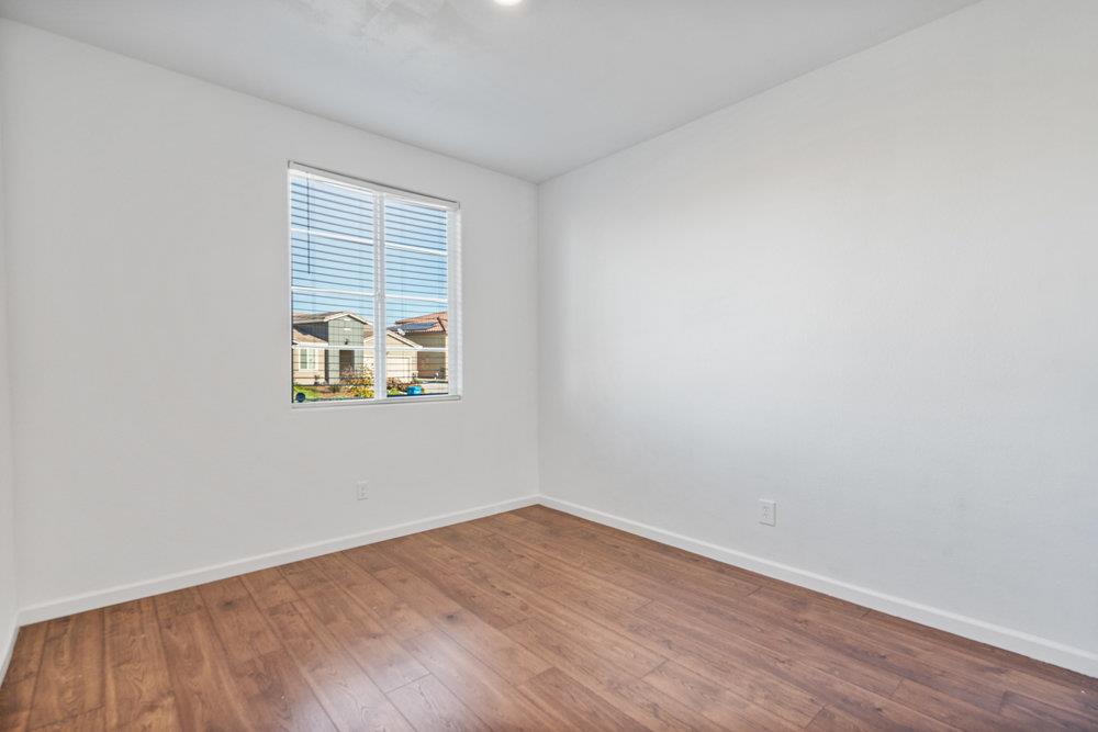 20 Hospital Road Hollister, CA 95023 - Photo 31 of 46 wooden floor in an empty room with a window
