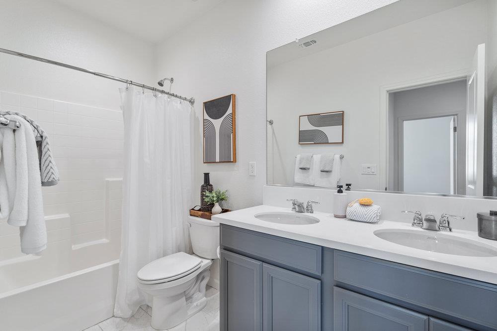 20 Hospital Road Hollister, CA 95023 - Photo 32 of 46 a bathroom with a sink toilet and shower