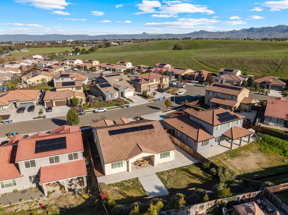 20 Hospital Road Hollister, CA 95023 - Photo 46 of 46 an aerial view of a city with lots of residential buildings and ocean view in back