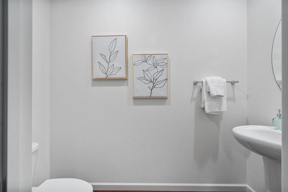 20 Hospital Road Hollister, CA 95023 - Photo 8 of 46 a bathroom with a toilet and a sink